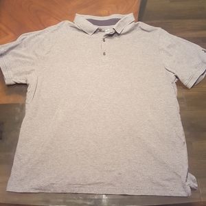 Under Armour Heat Gear Loose Polo. Gray.